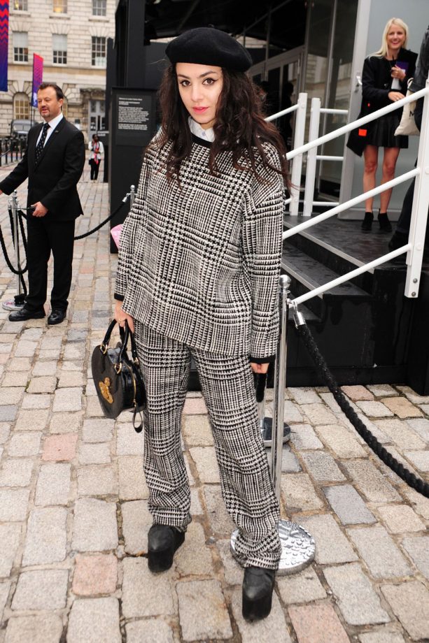 Charli XCX Wears A Jumper Suit And Beret To London Fashion Week, 2013