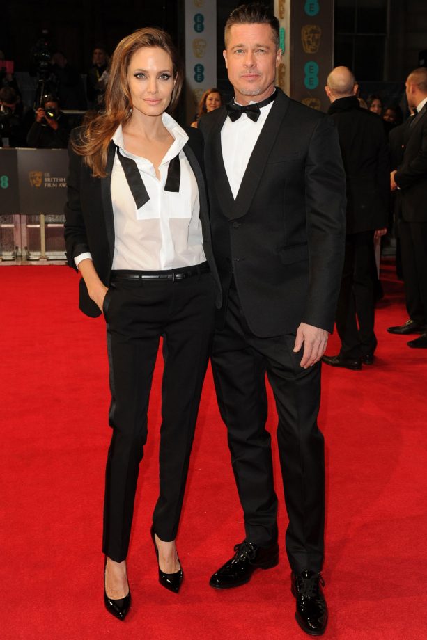 Angelina Jolie And Brad Pitt In Matching Monochrome Attend The BAFTAs, 2014
