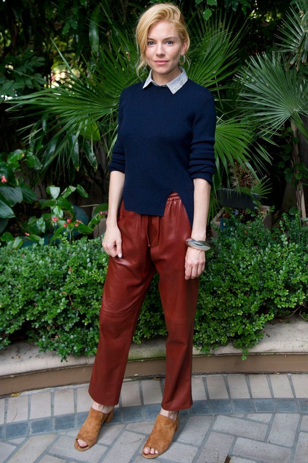 Sienna Miller Looks Relaxed In A Navy Jumper And Leather Trousers At The 'Burnt' Film Press Conference In LA, 2015