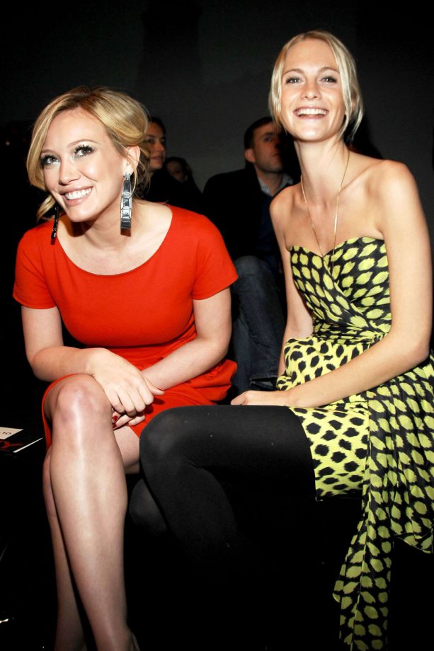 Hilary Duff And Poppy Delevingne Enjoy The DKNY Show At New York Fashion Week, 2009