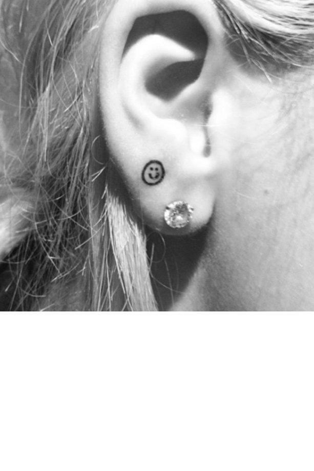 Rita Ora's Smiley New Ear Tattoo, 2014