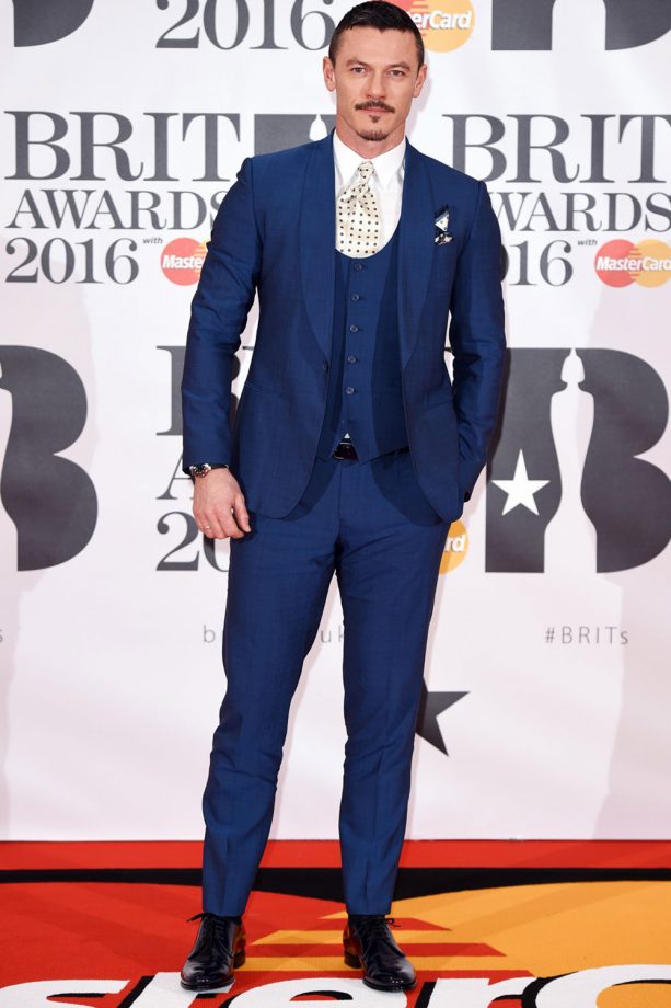 Luke Evans Is Smart In A Three-Piece Suit At The Brit Awards, 2016