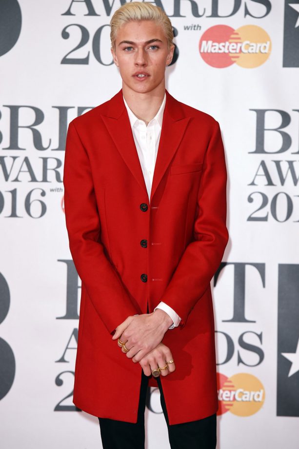 Lucky Blue Smith Chooses A Statement Red Jacket For The Brit Awards, 2016
