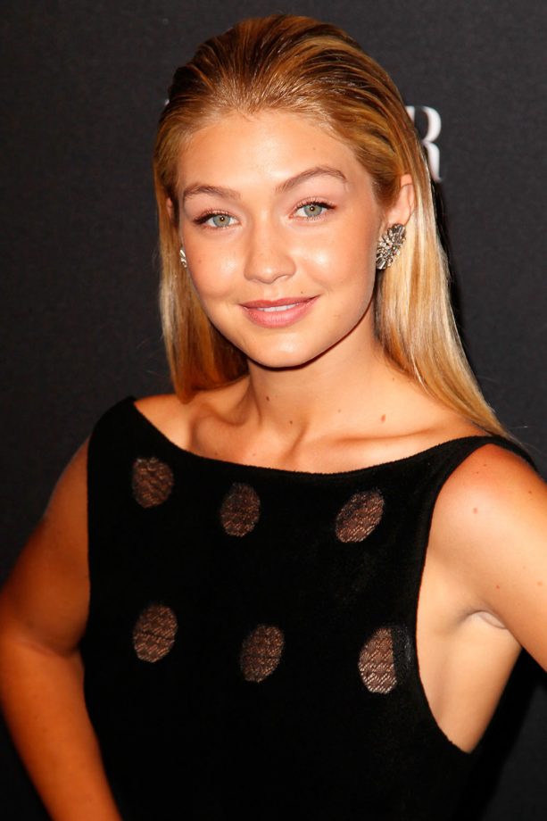 Gigi Hadid Works Minimal Make Up In Pink Tones And A Slick Hairdo, 2014