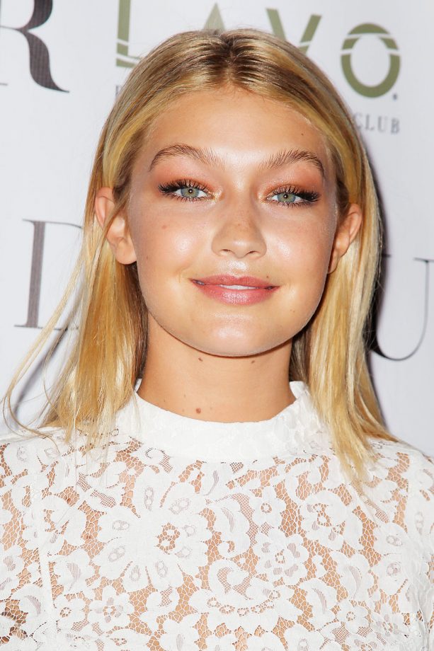 Gigi Hadid Looks Fresh With Her Glistening Gold Locks And Nude Lip, 2014