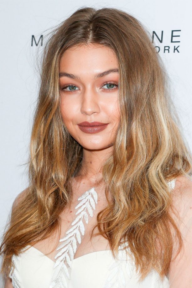 Gigi Hadid Looks Flawless With Tousled Curls And A Bronzed Look, 2016