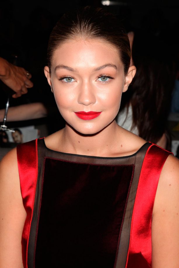 Gigi Hadid Shows Off Her Vibrant Red Lips Whilst Paired With A Simple Eyeshadow, 2015