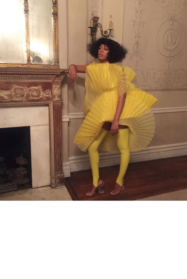 Solange Showcased Her Inimitable Style Prowess In A Yellow David LaPort Dress And Matching Leggings