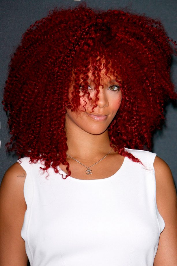 Rihanna Showing Us Her Caribbean Roots With A Loud Red Afro And Blushed Cheeks, 2011