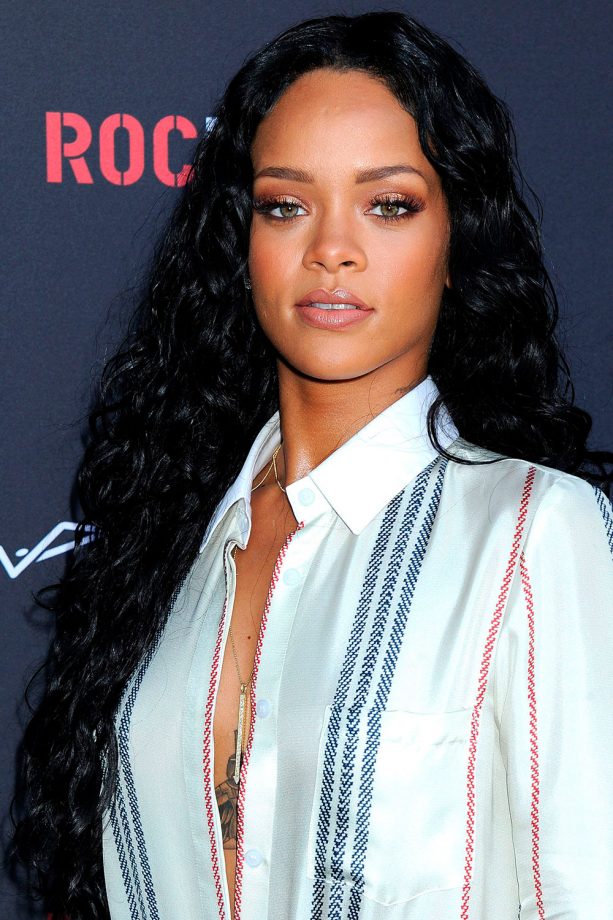 Rihanna's Powerful Long Jet Black Ringlets Work Well With Sunkissed Tones On Her Face, 2014
