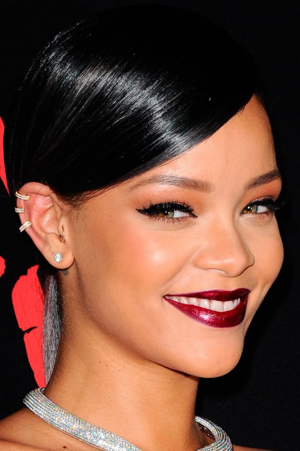 Rihanna Shines Beauty With A Slicked Side Fringe And Deep Red Lips, 2011