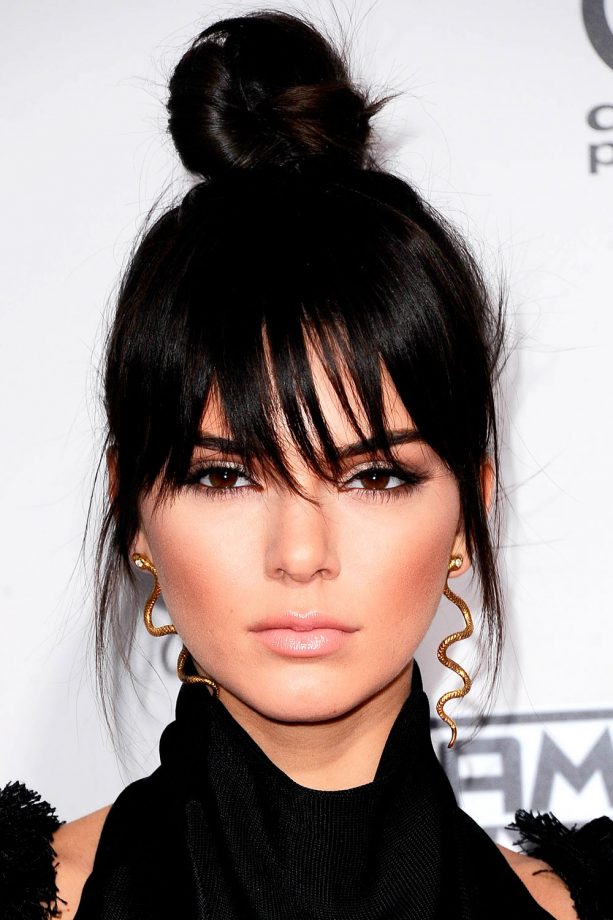 Kendall Jenner Working A Top Knot With Dramatic Fringe And A Bronzed Glow, 2015
