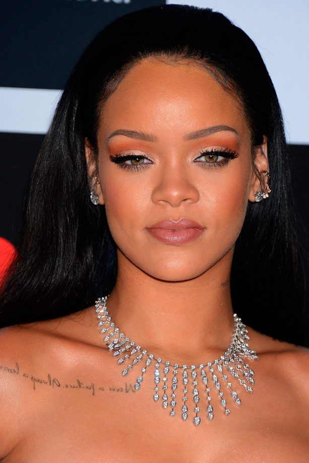 Rihanna Looks Flawless With Brushed Back Hair Showing Us Her Thick Lashes And Golden Tones, 2016