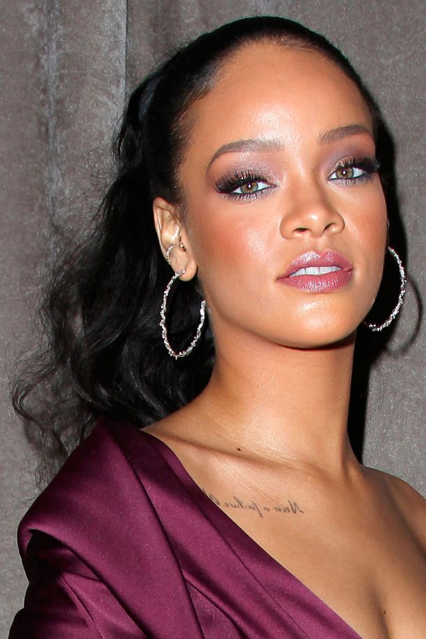 Rihanna Opts For A High Pony With Light Purple Glossy Lips And Purple Smokey Eye, 2015