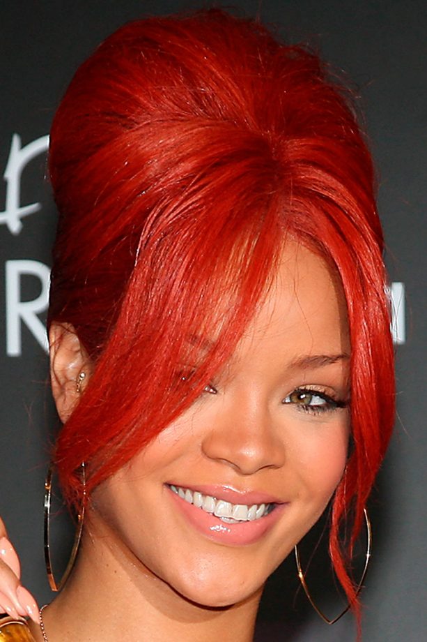 Rihanna Working A Red 60's Beehive With Long Bangs And A Gold Shimmer Eyeshadow, 2011