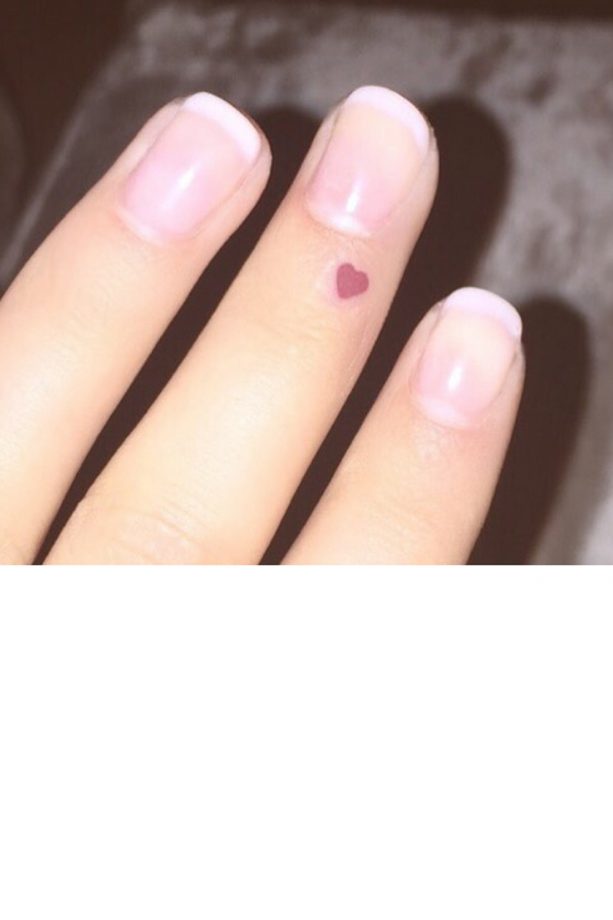 Cheryl Fernandez-Versini Shows Off A Tiny New Finger Tattoo, 2016