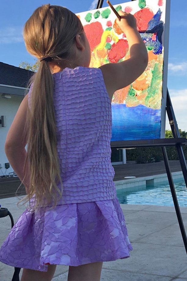 Victoria Beckham Shares A Cute Photo Of Harper Painting In The Sun (She's Good, Too!), 2016