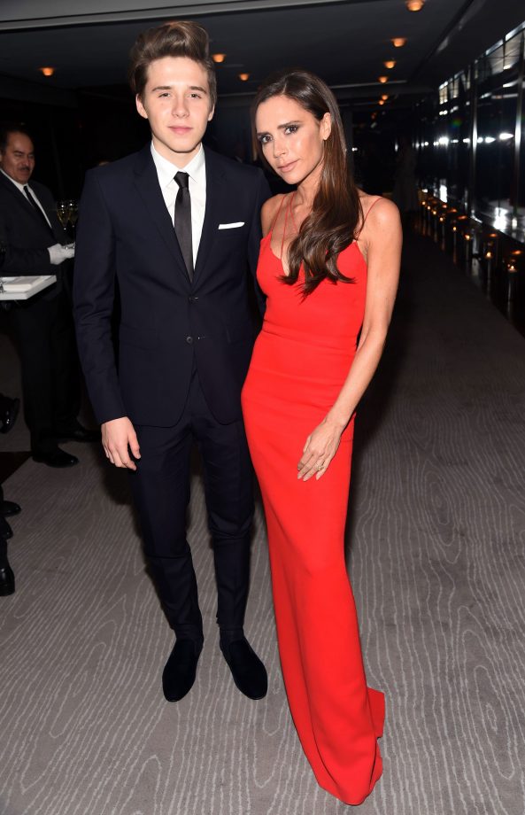Victoria Beckham Is Presented An Award By Her Son Brooklyn Beckham At A Woman Of The Year Awards In New York, 2015