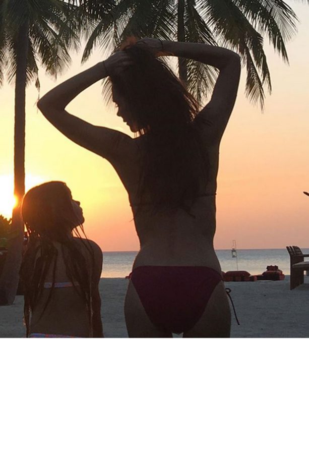 Victoria And Harper Beckham Pose Side By Side On Holiday Together, 2015