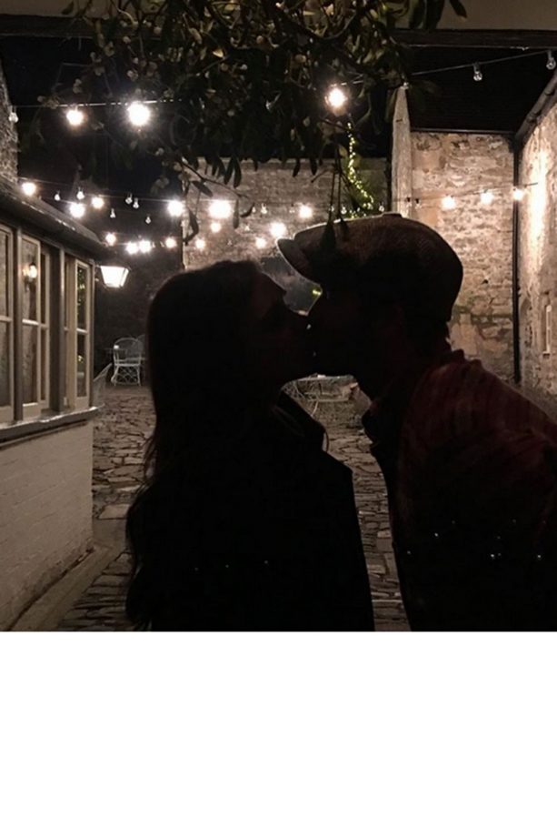 David And Victoria Beckham Share A Kiss Under The Mistletoe At Christmas, 2015