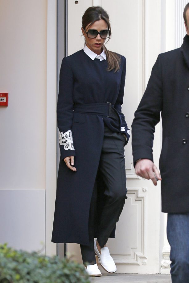 Victoria Beckham Works A Tailored Monochrome Coat And Collar With White Slip-On Shoes, 2016