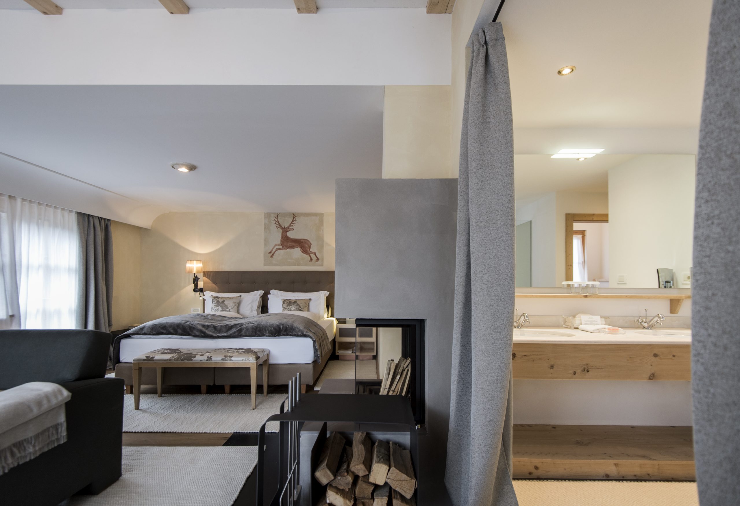 A Junior Suite room at Rosa Alpina, Italy